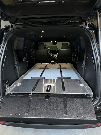 Mortuary transport deck with ramp and rollers